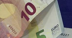 Euro reaches equal value to dollar for first time in 20 years