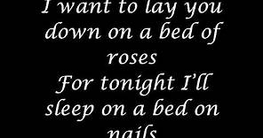 Bon Jovi - Bed of roses (lyrics).