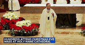 Parishioners fill Holy Name Cathedral for Midnight Mass in celebration of Christmas