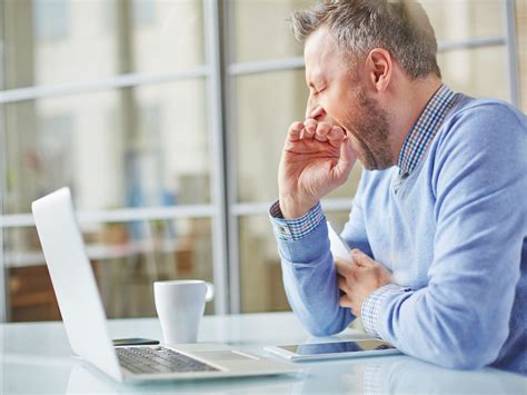 Image of a person feeling tired