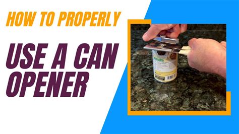Person using a can opener to open a can