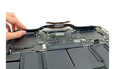 Exploring Cooling System Wiring for Optimal Performance in Apple MacBook 403