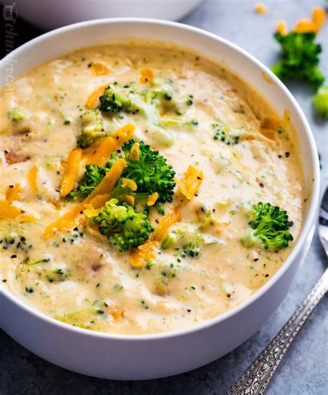 Broccoli rice being added to a soup