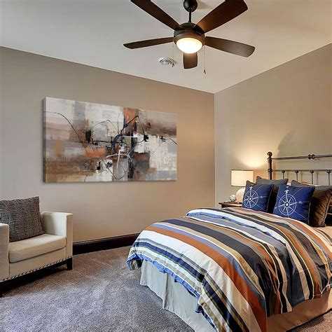 Bedroom with artwork and curios