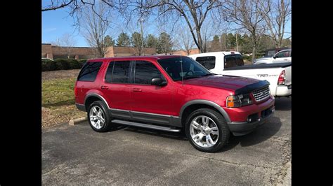 A well-maintained 2003 Ford Explorer parked in a scenic outdoor setting