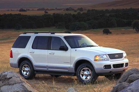 Front view of a 2005 Ford Explorer SUV parked on a scenic road