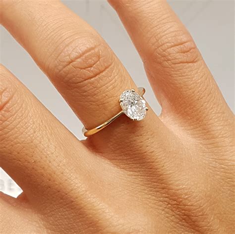 GIA Certified 5.01 Carat Oval Cut Diamond Classic Platinum Engagement Ring at 1stDibs oval