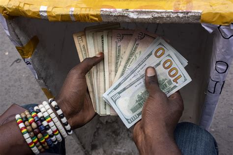 100 usd to congolese franc