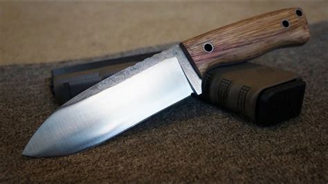 10" san mai chefs knife made from 1084 steel with a bike chain