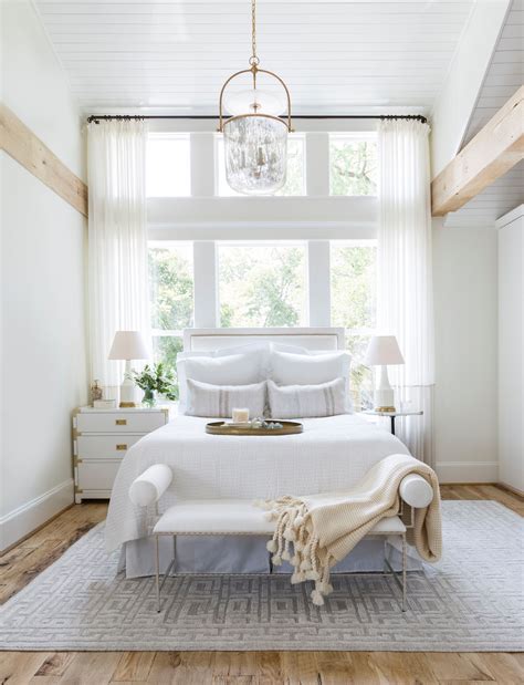 14. Opt for light and airy curtain ideas in a small bedroom