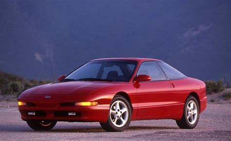 Front three-quarter view of a 1993 Ford Probe in a dynamic pose