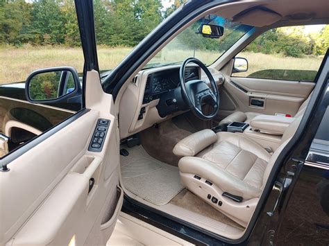 Interior view of a well-maintained 1994 Ford Explorer, highlighting its classic dashboard and seating.