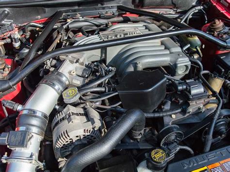 View of the 5.0L V8 engine bay of a 1995 Ford Mustang Cabrio