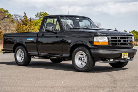 Engine bay of a 1995 Ford F-150 Lightning showcasing its V8 engine