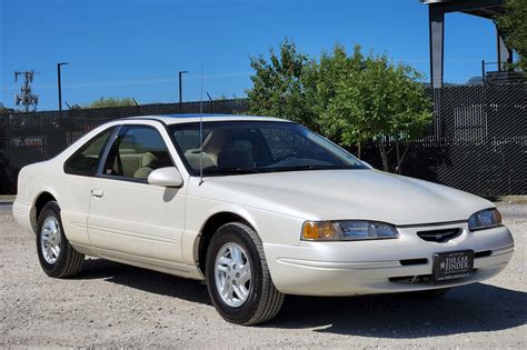 Sleek profile of a 1996 Ford Thunderbird