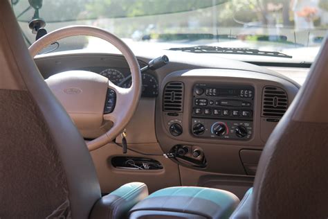 Interior view of a 1998 Ford Expedition, showcasing its spaciousness and dashboard