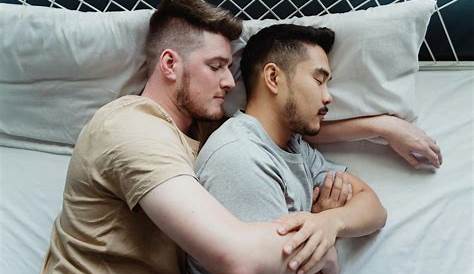 Two Men Cuddling in Bed · Free Stock Photo