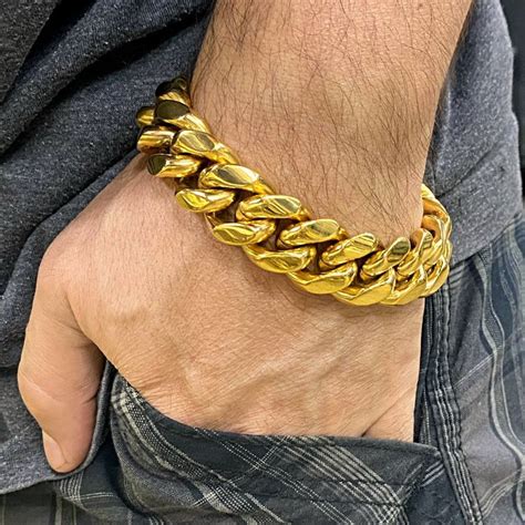 GASOLINE GLAMOUR THUNDERBIRD BLACK POWDER BANGLE GOLD TONE BRASS PLATED