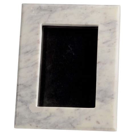 2. Install marble in a frame to create a bespoke piece of art