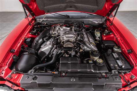The powerful supercharged V8 engine of the 2001 Ford Mustang Cobra
