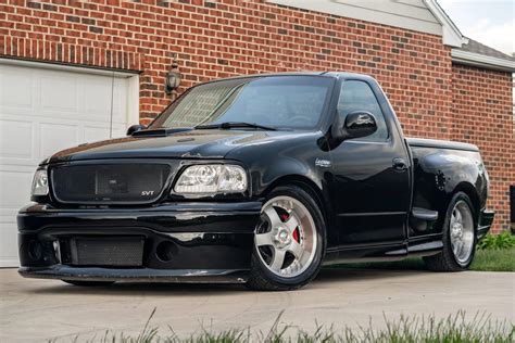 2002 Ford F-150 Lightning roaring down the road
