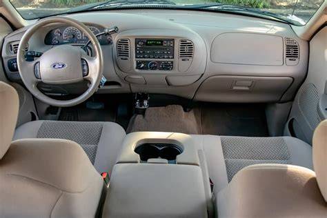 Spacious interior of a 2003 Ford F-150 SuperCrew highlighting passenger comfort and versatility