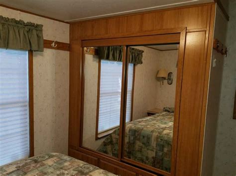 Discover the Classy Charm of 2004 Trophy Park Model Today!