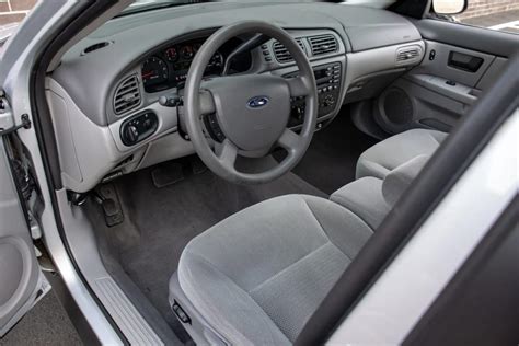 Interior of a 2005 Ford Taurus showcasing its spacious cabin and dashboard