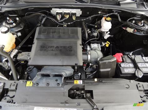 Close-up of the 2010 Ford Escape XLT engine bay, highlighting its reliable powertrain