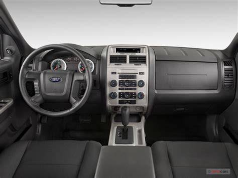 Interior view of a 2012 Ford Escape, showcasing its spaciousness and dashboard layout