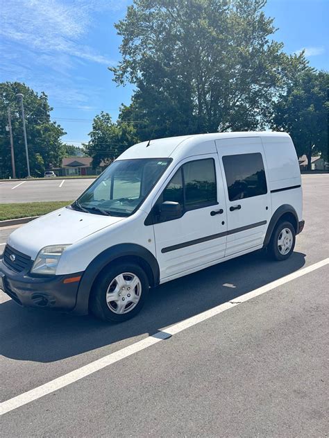 Front view of a silver 2012 Ford Transit van