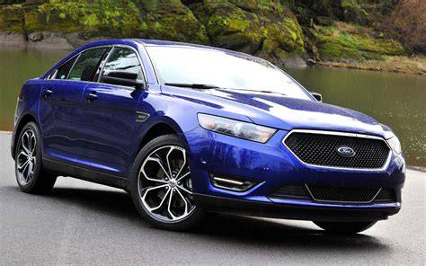 Exterior view of a 2013 Ford Taurus showcasing its distinctive grille and silhouette