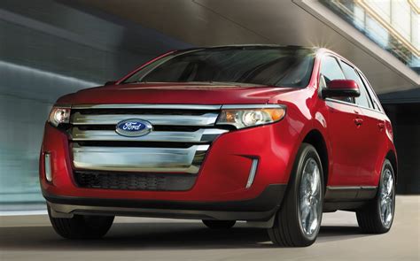 Front view of a 2014 Ford Edge SUV in a dynamic pose