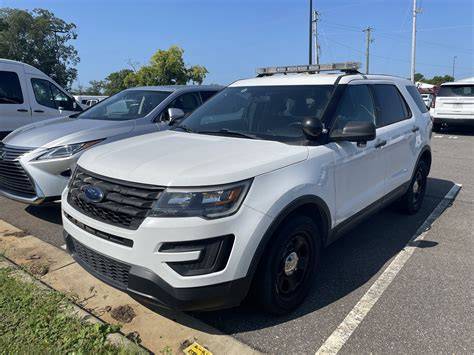 Interior of a 2018 Ford Explorer Interceptor showcasing comfortable climate control settings.