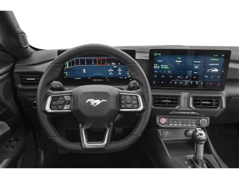 Interior view of the 2024 Ford Mustang EcoBoost Fastback dashboard and seats