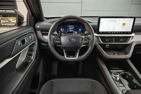 Interior view of the 2025 Ford Explorer ST, showcasing its premium materials, sporty seats, and advanced infotainment system, reflecting its interior specs.