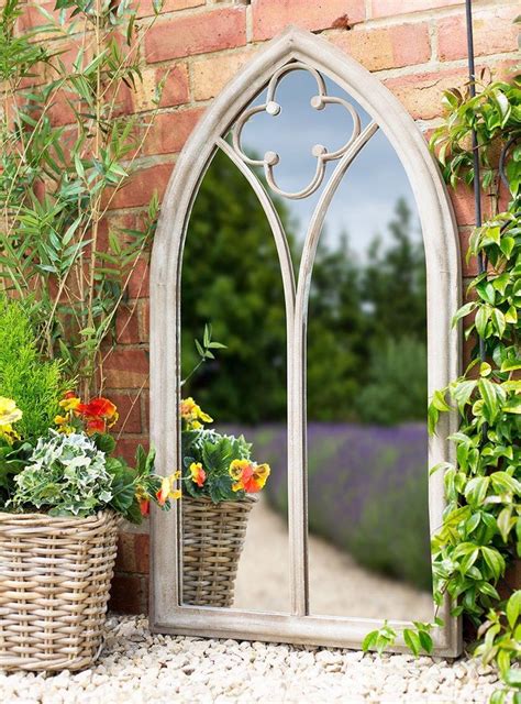 27. Use mirrors in the garden to cheat a small space