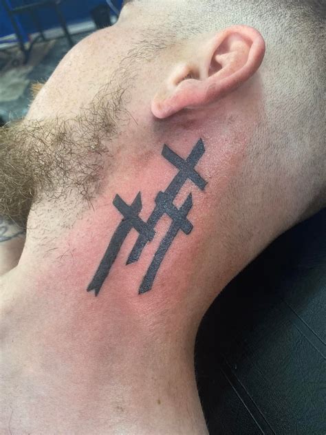 3 Crosses Tattoo On Neck Meaning