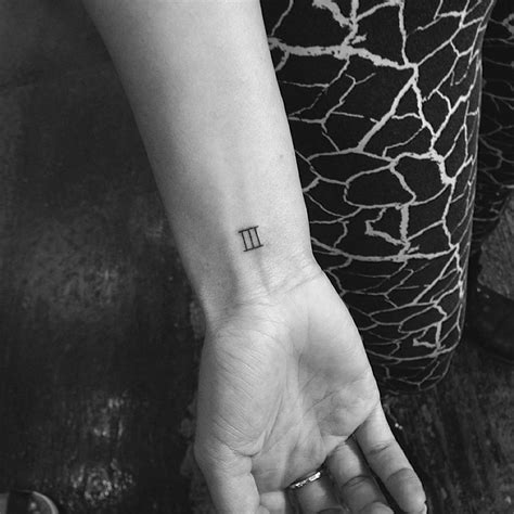 3 Roman Numeral Tattoo