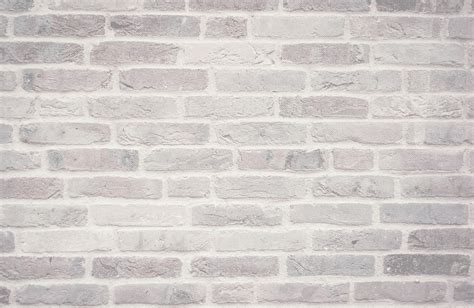 Whitewashed brick exterior love the limed brick look and the grey