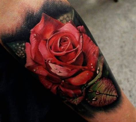 Awesome 3D Camera With Flowers Tattoo On Half Sleeve
