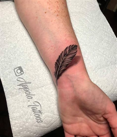 40 Inspiring Feather Tattoos To Show Off Your Creative
