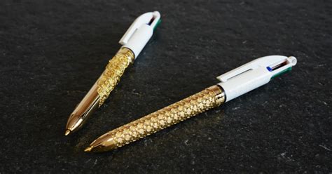 stylo 4 couleurs en or