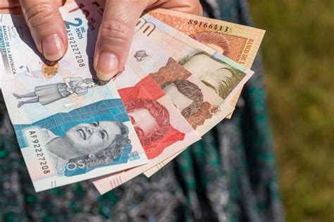 40000 colombian pesos to usd