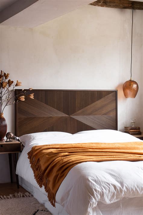 5. Make a style statement using positive space with patterned headboards in the bedroom