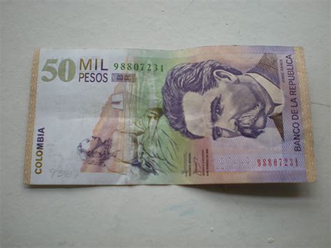 50 million colombian pesos to dollars