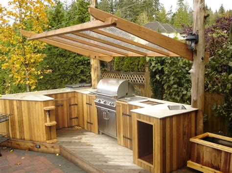 56 Cool Outdoor Kitchen Designs I love this dark outdoor kitchen with