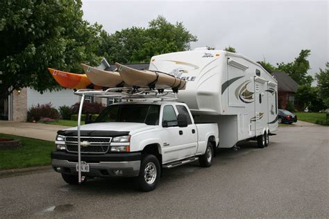 Home made solution for hauling kayaks with a 5th wheel camper. Kayak