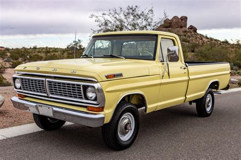 A classic 1970 Ford F150 pickup truck in pristine condition, showcasing its iconic design.