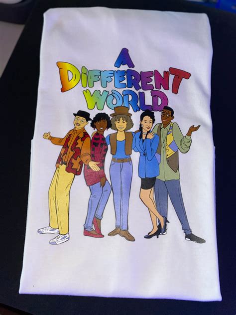 Explore a New Dimension with Our A Different World T-Shirt!